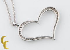 0.45 Carat Heart Pendant with Pavé Set Diamonds in 14 Karat White Gold