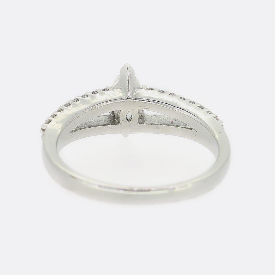 This is an 18ct white gold diamond solitaire ring. The central diamond is a 0.45-carat marquise cut and site in between a beautiful diamond set split shank.

Condition: Used (Very Good)
Weight: 4.9 grams
Size: P 1/2 (57)
Centre Diamond: Approx. 0.45
