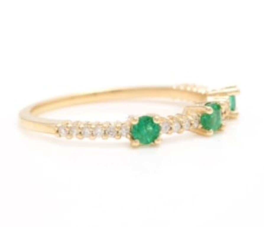 0.45 Carats Natural Emerald and Diamond 14K Solid Yellow Gold Ring

Total Natural Green Emeralds Weight is: Approx. 0.30 Carats (transparent)

Natural Round Diamonds Weight: 0.15 Carats (color G-H / Clarity SI1-SI2)

Ring size: 6.75 (we offer free