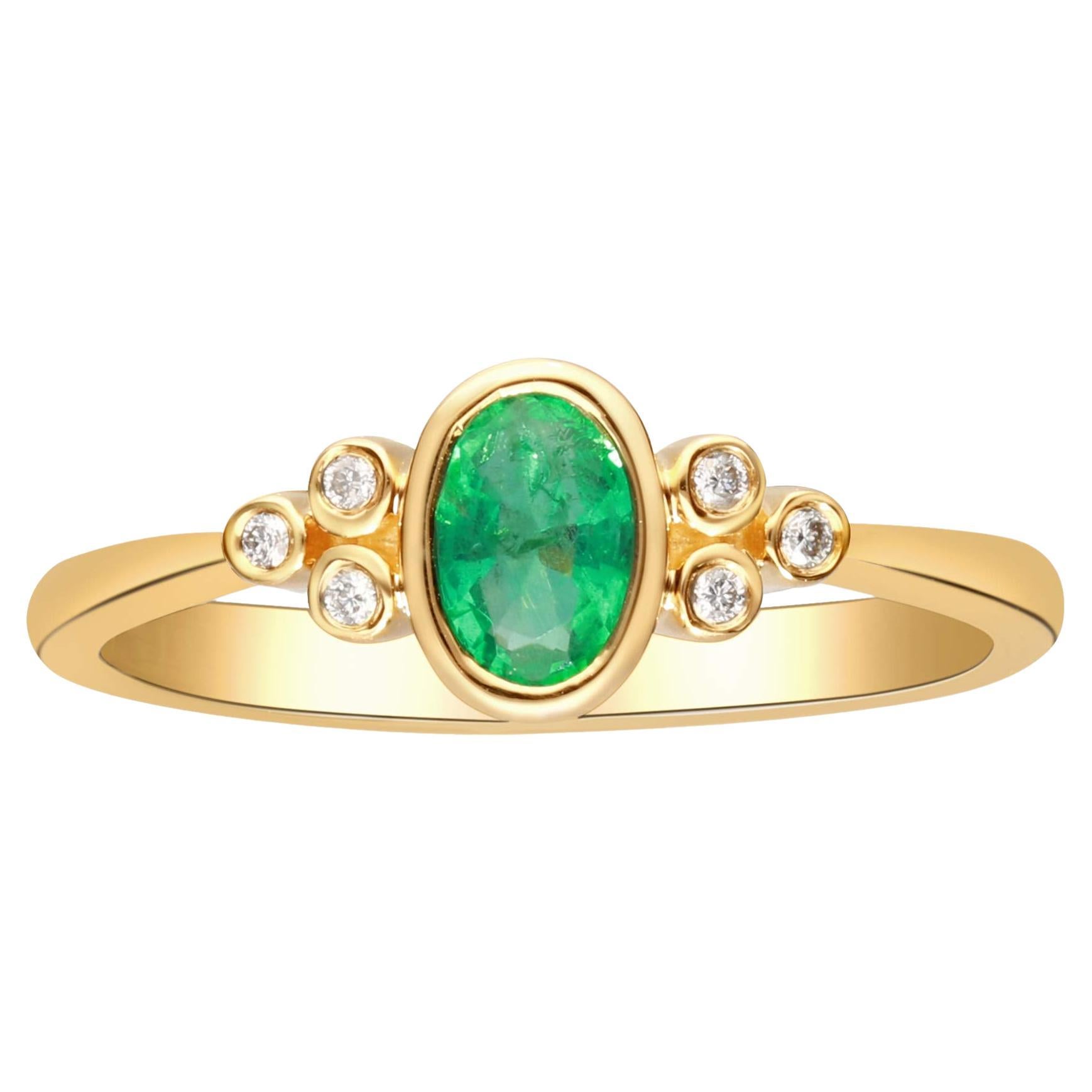 0.45 Carat Oval Cut Emerald with Diamond Accents 10K Yellow Gold Ring For Sale