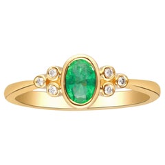 0.45 Carat Oval Cut Emerald with Diamond Accents 10K Yellow Gold Ring