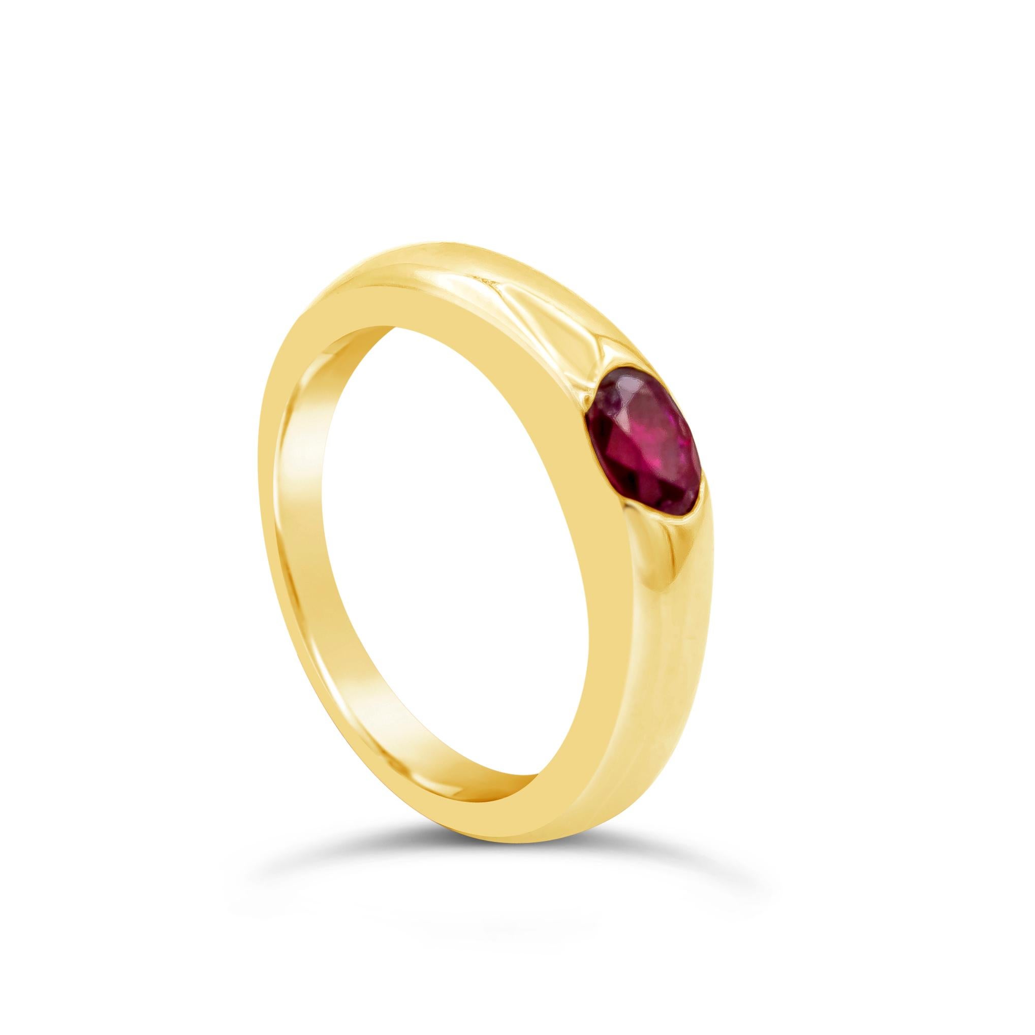 A simple and chic wedding band showcasing an oval cut color-rich ruby, flush set in 14k yellow gold weighing 0.45 carats total. A simple ring perfect for both male and female. Size 6.5 US resizable upon request.

Style available in different price