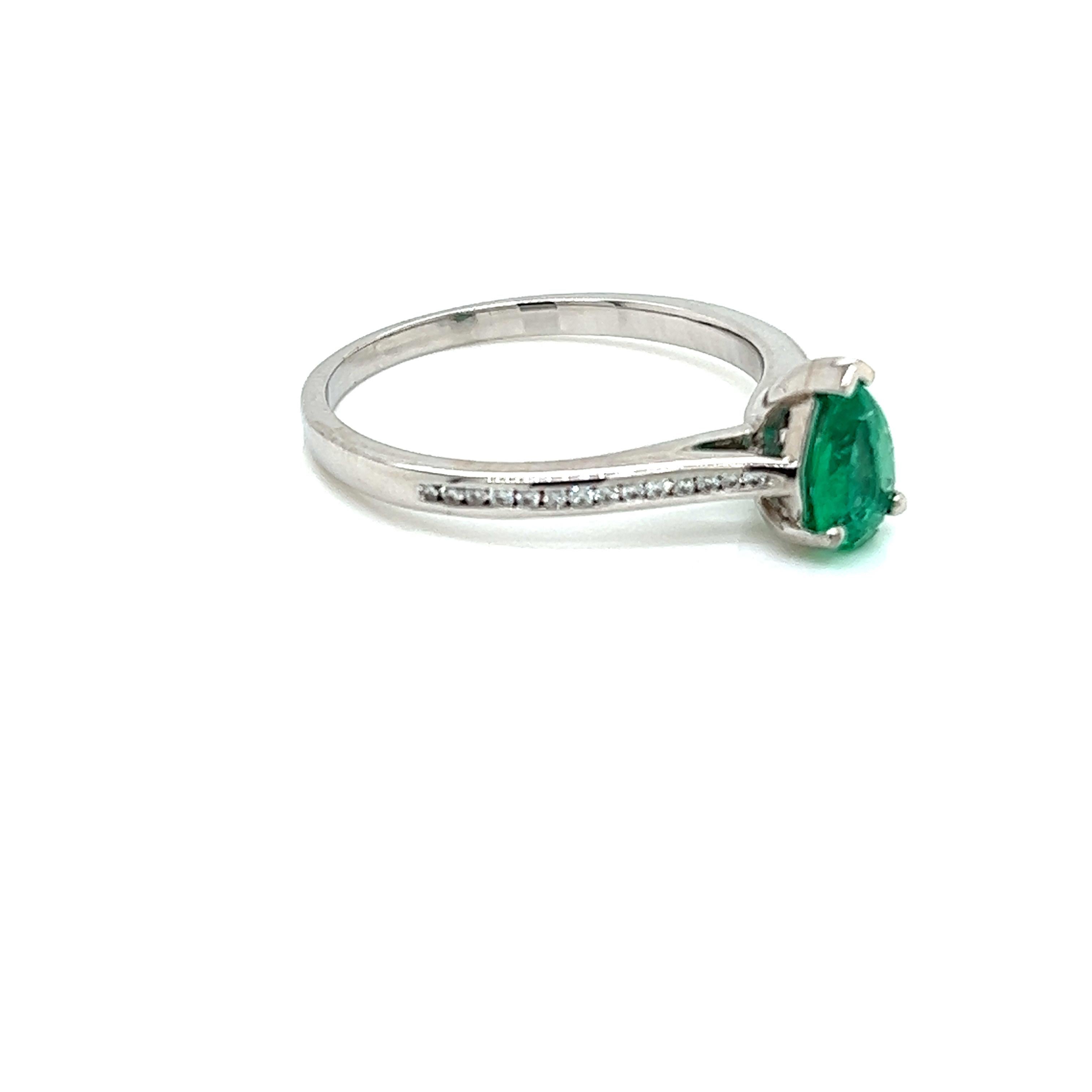 Pear Cut 0.45 Carat Pear Shape Emerald and Diamond Ring in 18 Karat White Gold For Sale