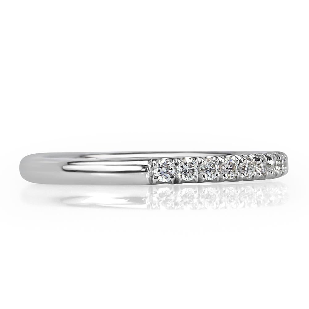 This exquisite diamond wedding band features 0.45ct of round brilliant cut diamonds graded at E-F, VS1-VS2. The diamonds are hand set in high polish platinum.