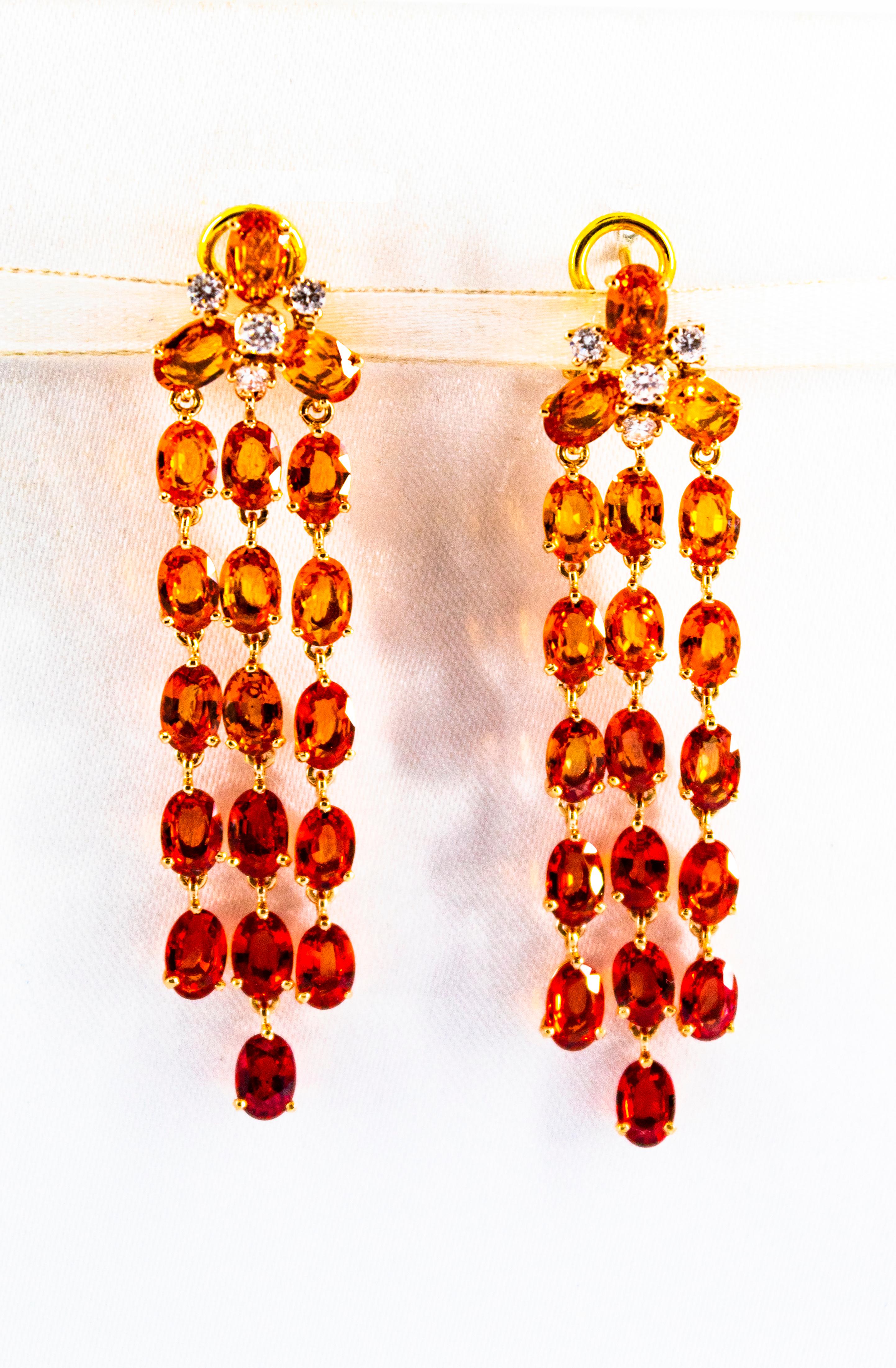 These Earrings are made of 14K Yellow Gold with 18K Yellow Gold Clips.
These Earrings have 0.45 Carats of White Diamonds.
These Earrings have 21.30 Carats of Yellow Sapphires.
These Yellow Sapphires create a waterfall that starts with an intense