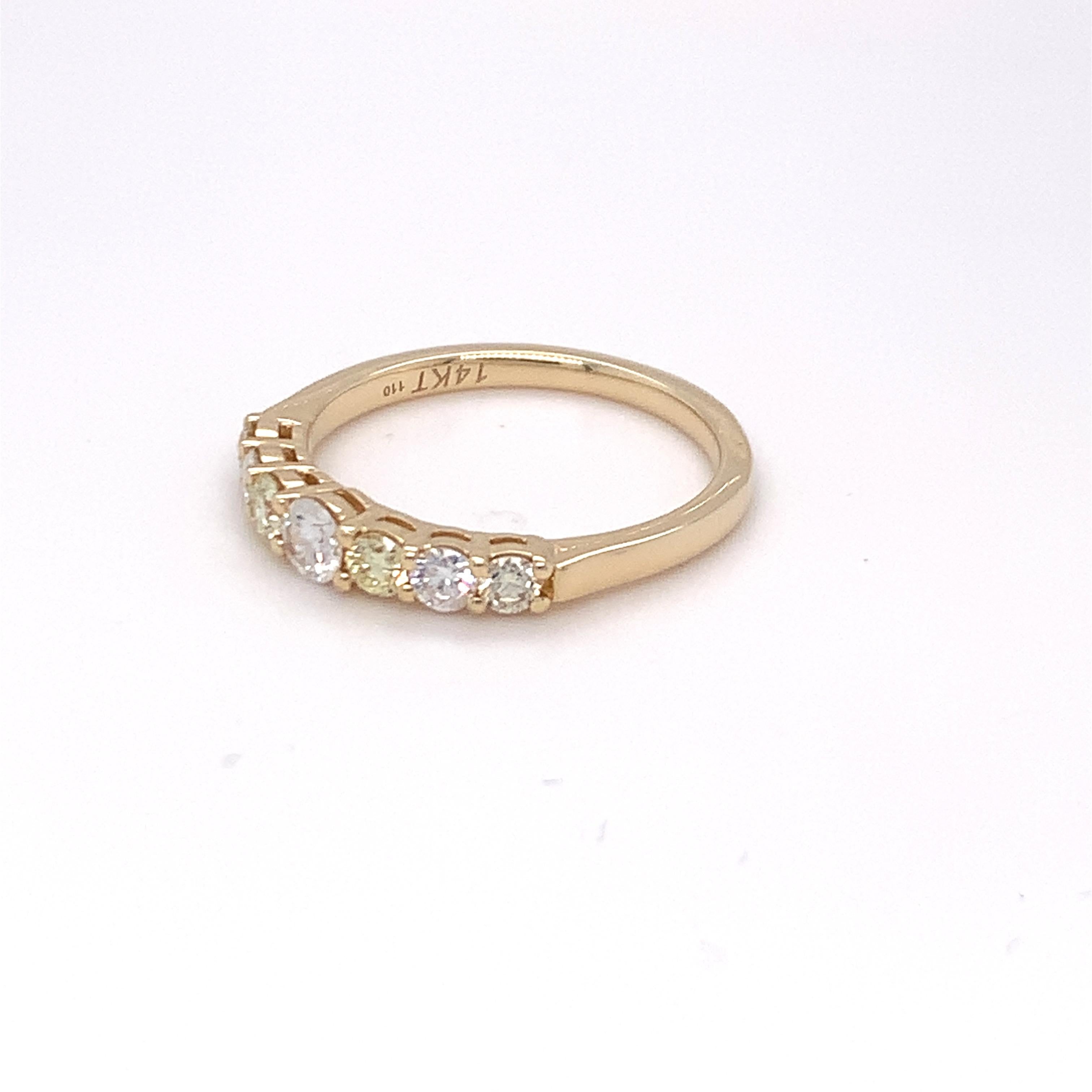 A combination of yellow and white diamonds makes this seven stone band a stunning piece of jewelry. Set in yellow gold and finished with skilled hands.
Yellow Diamond: 0.23ct
White Diamond: 0.22ct
Gold: 14K Yellow
Ring Size:7