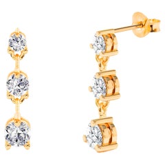 Boucles d'oreilles cloutées avec diamants 0,45ct en or 14k