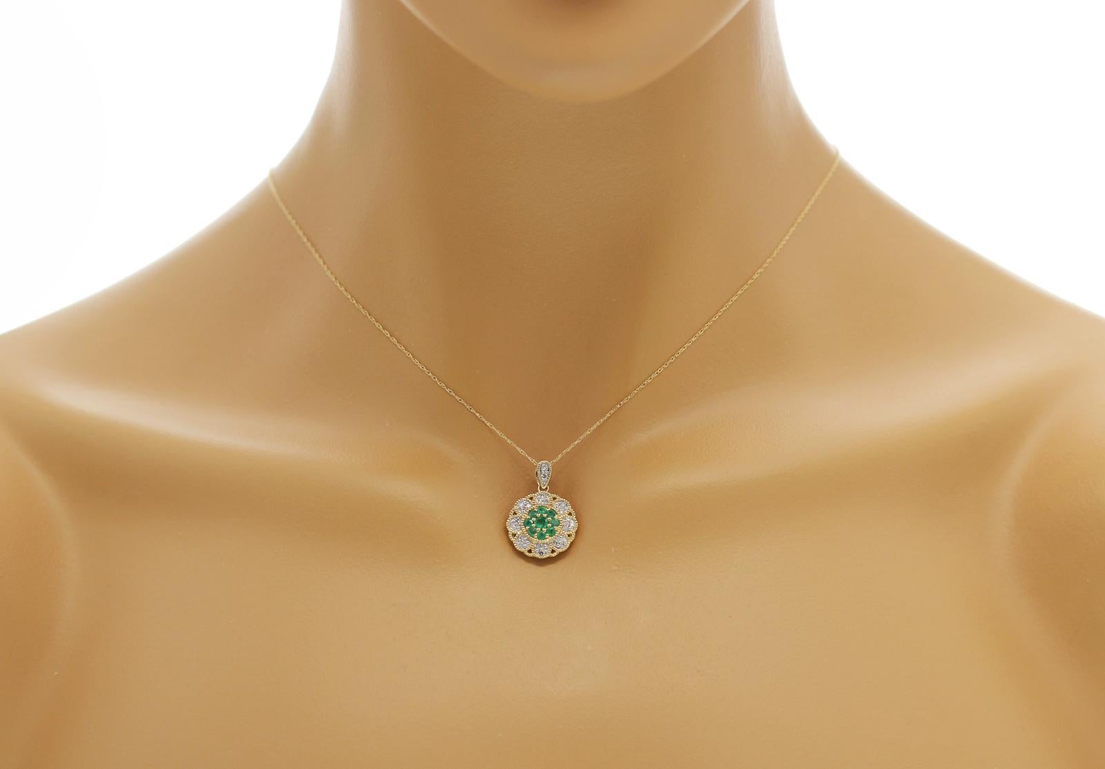 Round Cut 0.45 Ct Emerald 0.27 Ct Diamond 14K Yellow Gold Flower Pendant Necklace For Sale