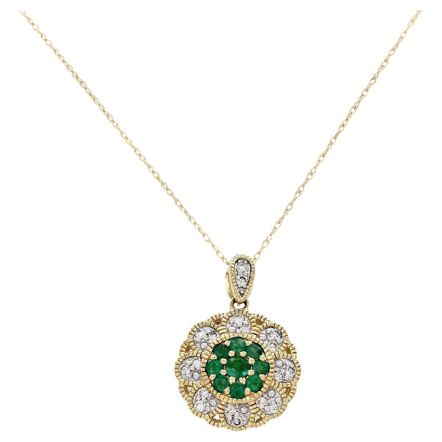 0.45 Ct Emerald 0.27 Ct Diamond 14K Yellow Gold Flower Pendant Necklace For Sale