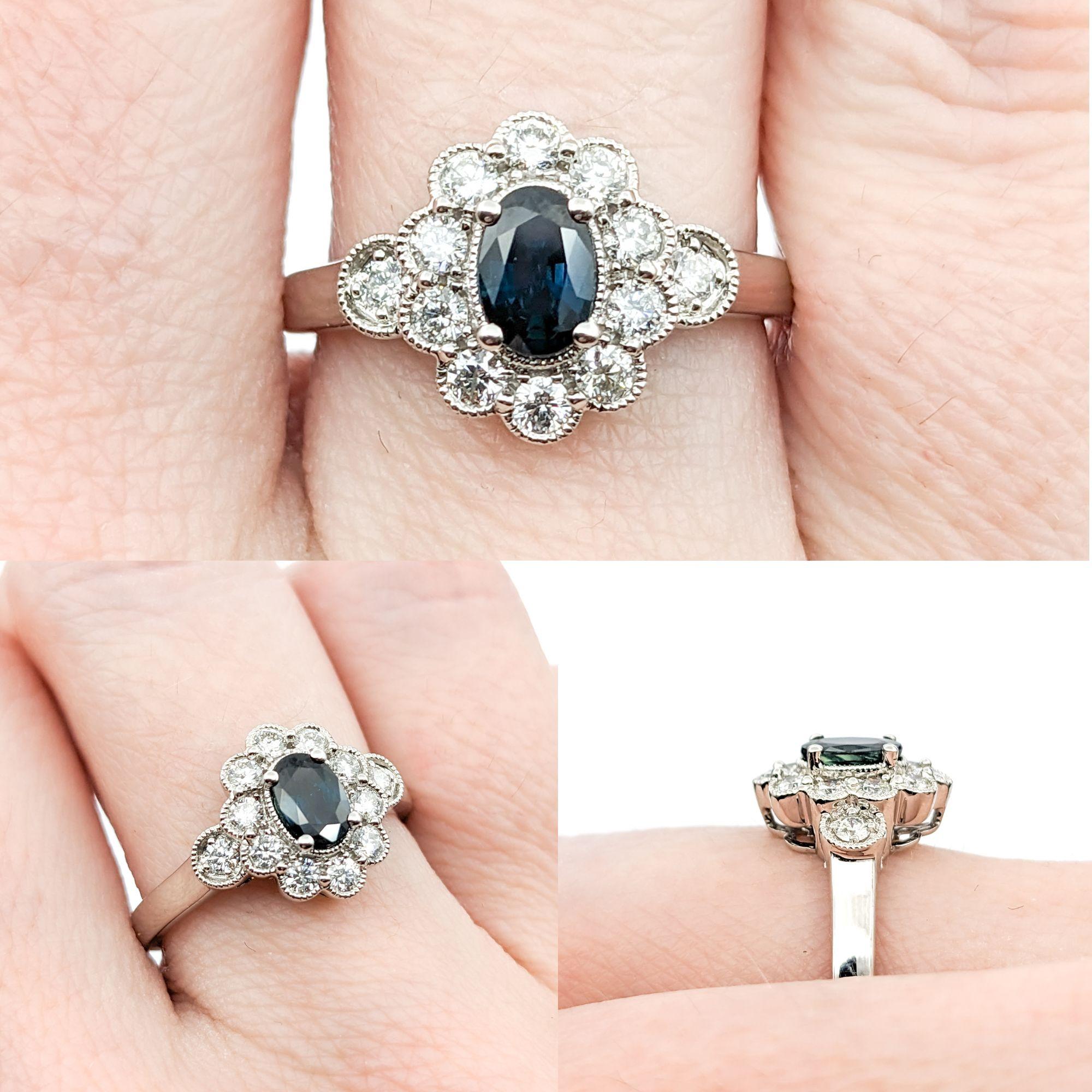 0.45ct Blue Sapphire & Diamond Ring In White Gold



This stunning ring, meticulously crafted in 14kt white gold, showcases a captivating 0.45ct sapphire centerpiece. This gem is beautifully accented by 0.31ctw of round diamonds, boasting SI clarity