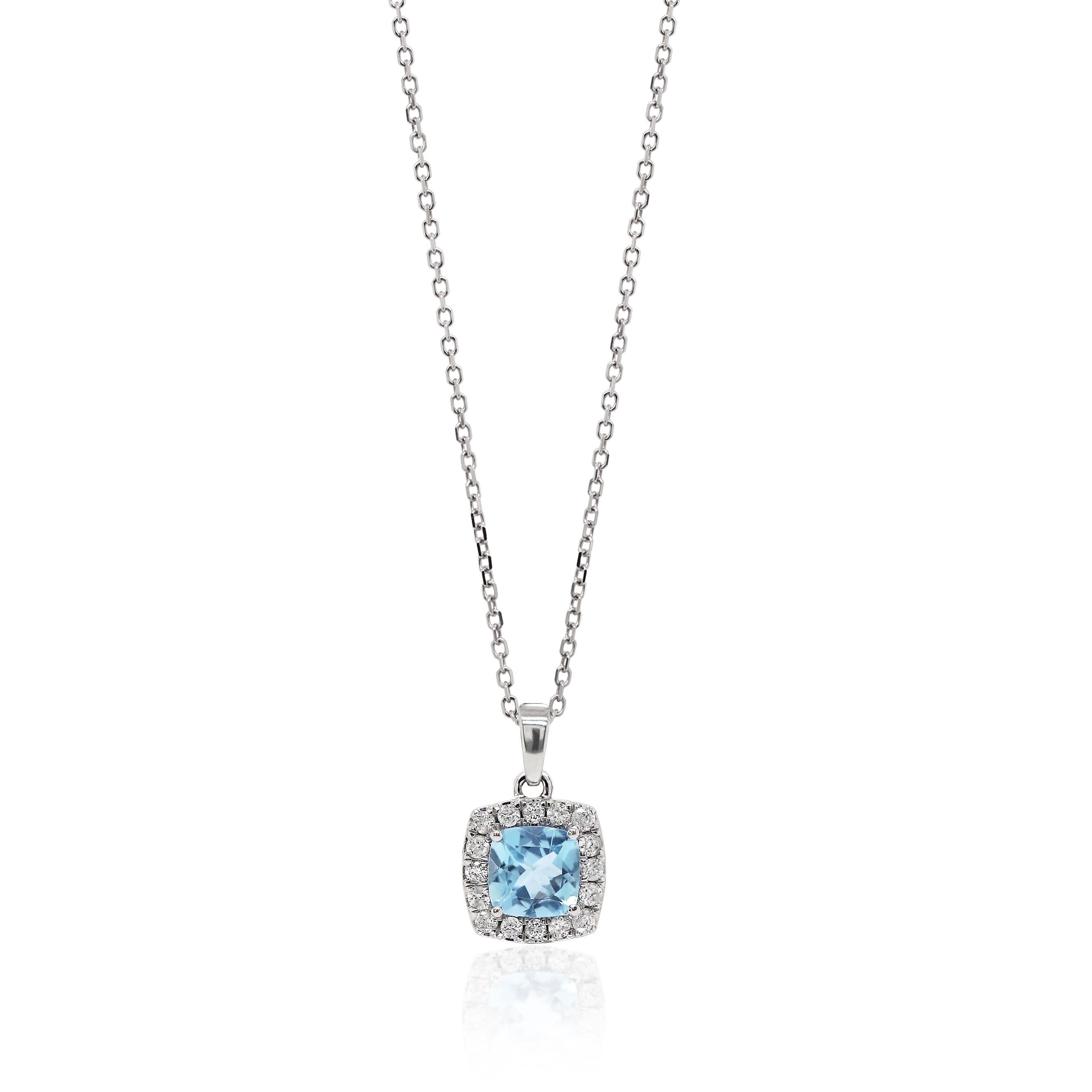 Pendant featuring a cushion shape aquamarine weighing 0.45ct claw set in an open back mount. 
The aquamarine is beautifully surrounded by 16 claw set fine quality round brilliant cut diamonds weighing a total of 0.14ct, all mounted in 18 carat white