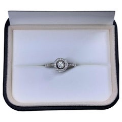0.45ct Diamond Halo Solitaire Engagement Ring In Platinum