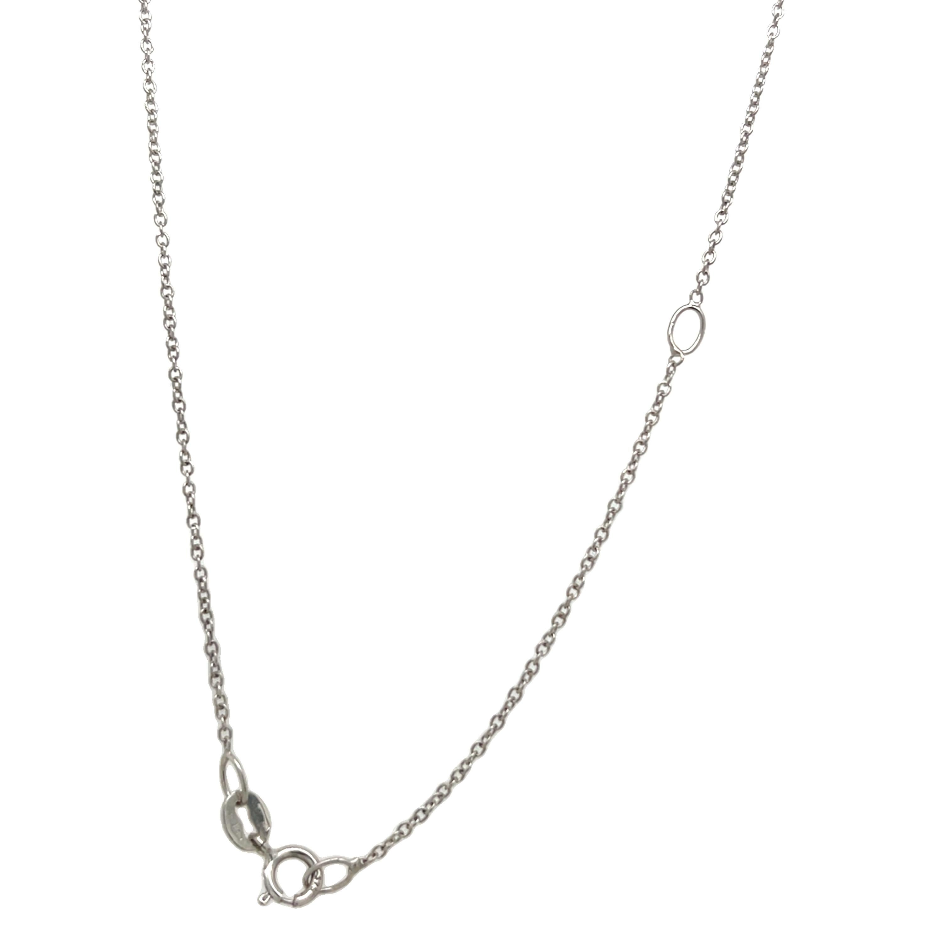 This elegant pendant showcases a vibrant 0.45ct round ruby beautifully complemented by 0.59ct of sparkling round natural diamond, all set in luxurious 18ct white gold. A timeless piece that combines classic design with exceptional craftsmanship —