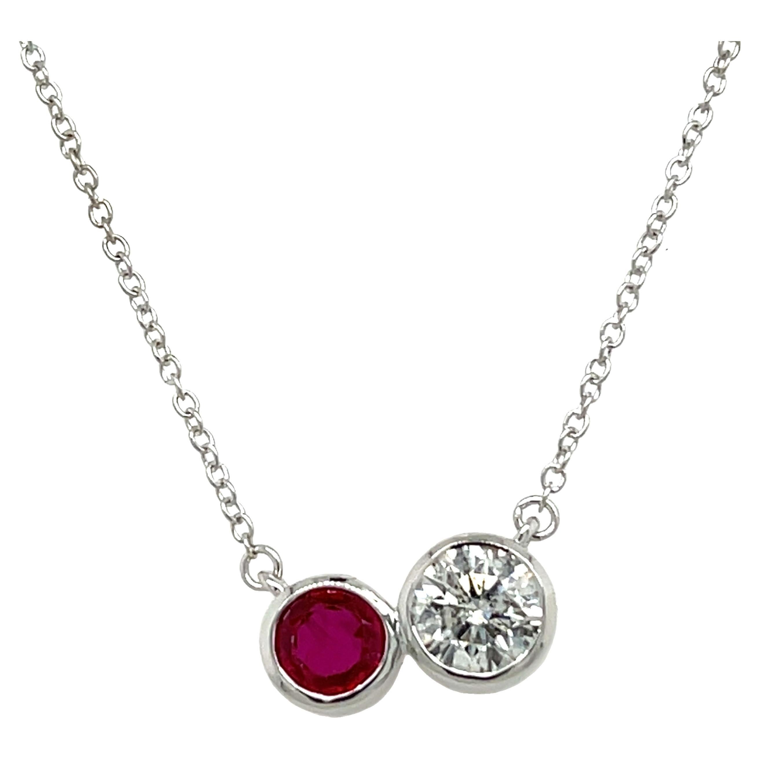 0.45ct Round Ruby & 0.59 Diamond Pendant Set in 18ct White Gold
