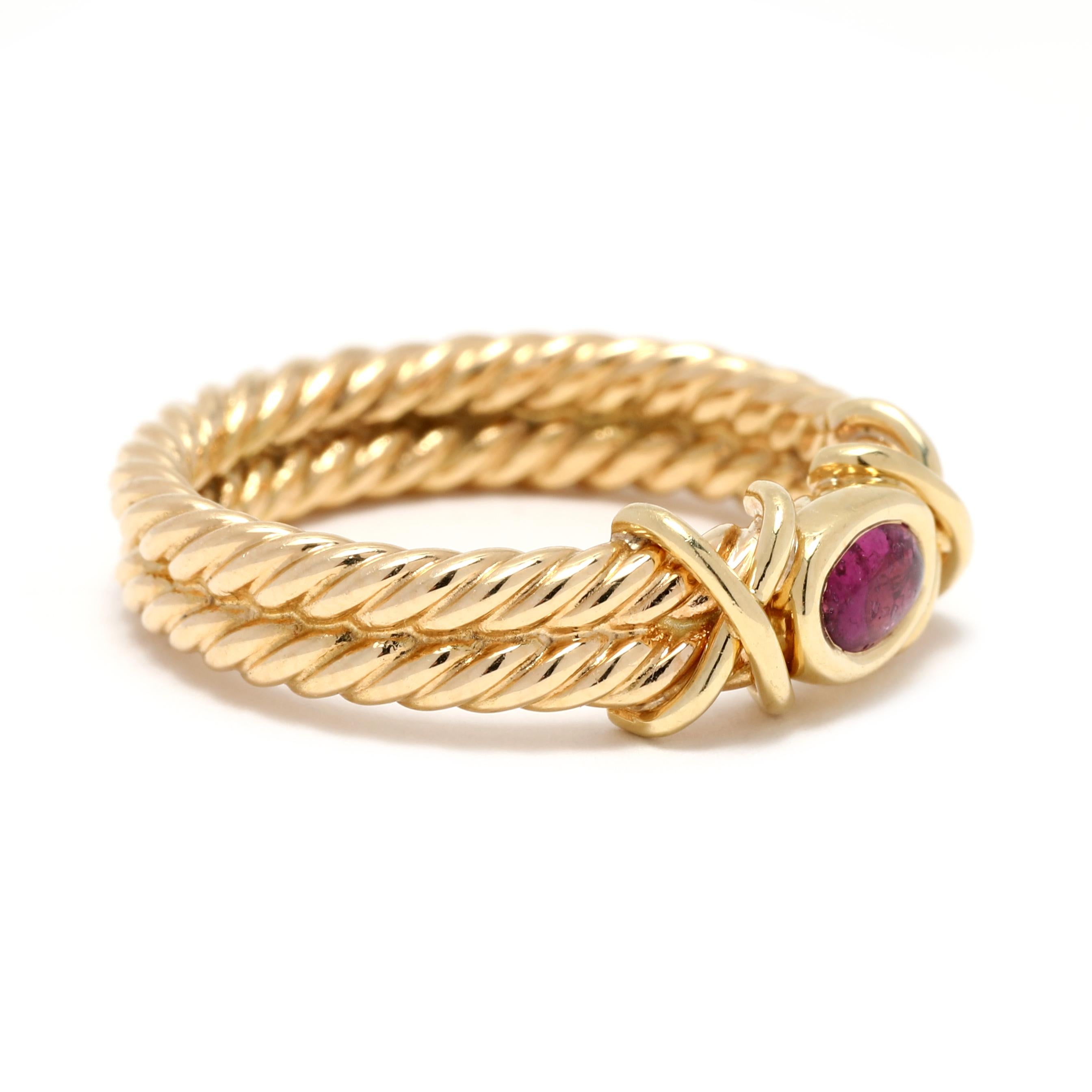 This stunning 0.45ctw cabochon ruby rope band ring is made of 18K yellow gold. This beautiful double X rope band ring has a ring size of 6.25 and is perfect for any occasion. The deep red of the cabochon rubies and the bright yellow gold make this