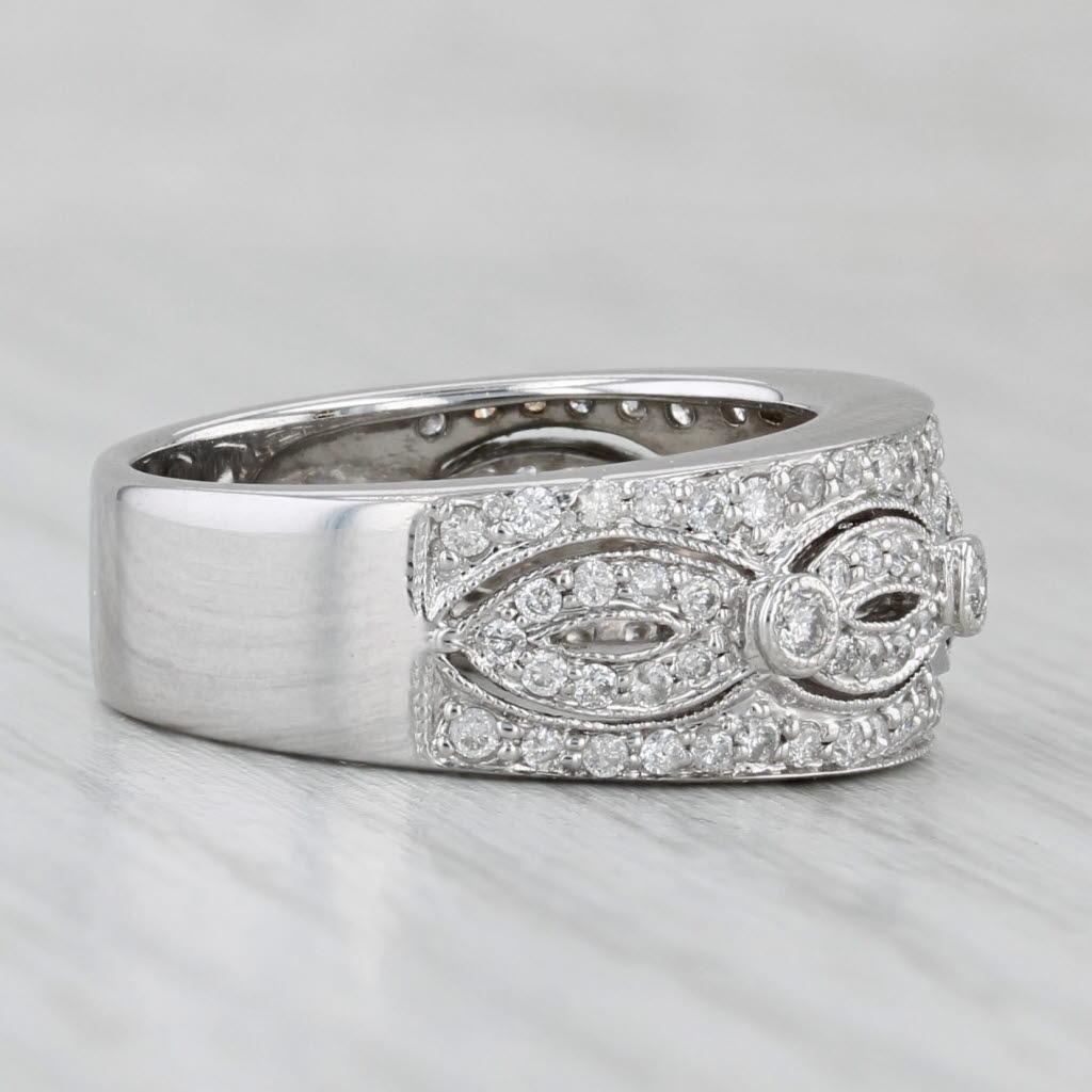 Gemstone Information:
- Natural Diamonds -
Total Carats - 0.45ctw
Cut - Round Brilliant
Color - F - G
Clarity - I1 - I3

Metal: 14k Yellow Gold 
Weight: 5.2 Grams 
Stamps: 14k
Face Height: 8.3 mm 
Rise Above Finger: 4.5 mm
Band / Shank Width: 5.7