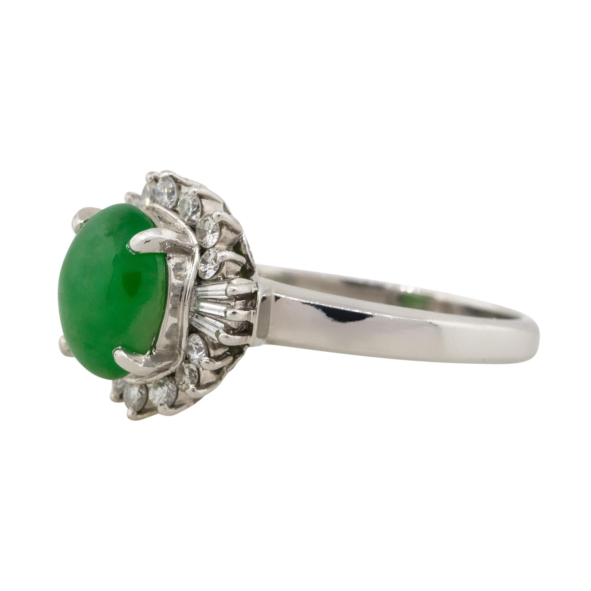 Material: Platinum
Gemstone details: Jade cabochon center gemstone
Diamond details: Approx. 0.46ctw of round & baguette cut Diamonds. Diamonds are G/H in color and VS in clarity
Ring Size: 8.5 
Ring Measurements: 0.90