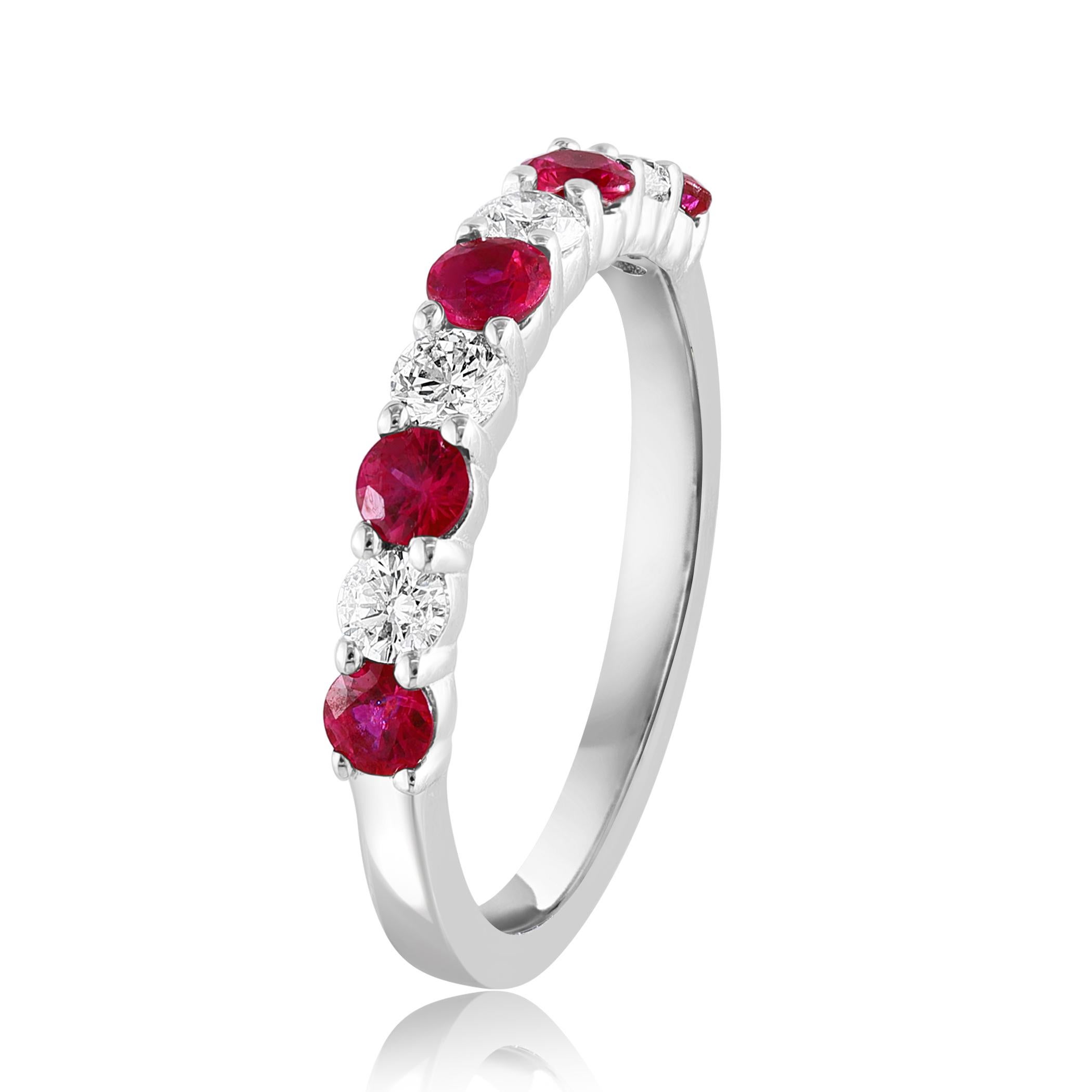 A fashionable and classic wedding band showcasing 4 brilliant cut diamonds weighing 0.37 carats total alternating with 5 round lush rubies weighing 0.46 carats. Stones secured with a shared 4 prong setting made with 14K white gold. A versatile piece