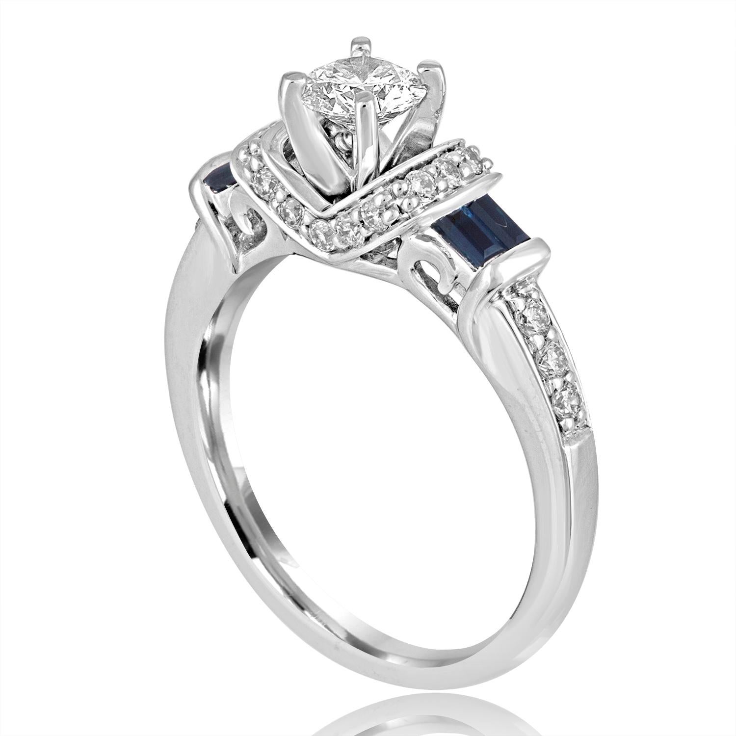 The ring is 14K White Gold
The center stone is 0.46 Carats G SI2
There are 4 step cut baguettes blue sapphires 0.40 Carats
There are 0.25 Carats in Small Round diamonds H SI
The ring is a size 6.75, sizable.
The ring weighs 4.1 grams.