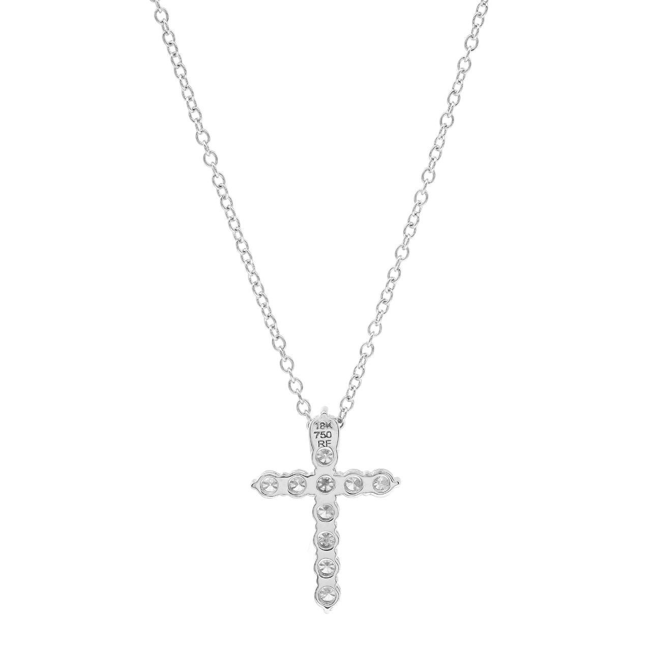 Nous vous présentons notre superbe collier pendentif croix en diamant de 0,46 carat en or blanc 18 carats ! Ce collier met magnifiquement en valeur votre foi avec un éclat brillant. Le pendentif en forme de croix est méticuleusement réalisé avec des