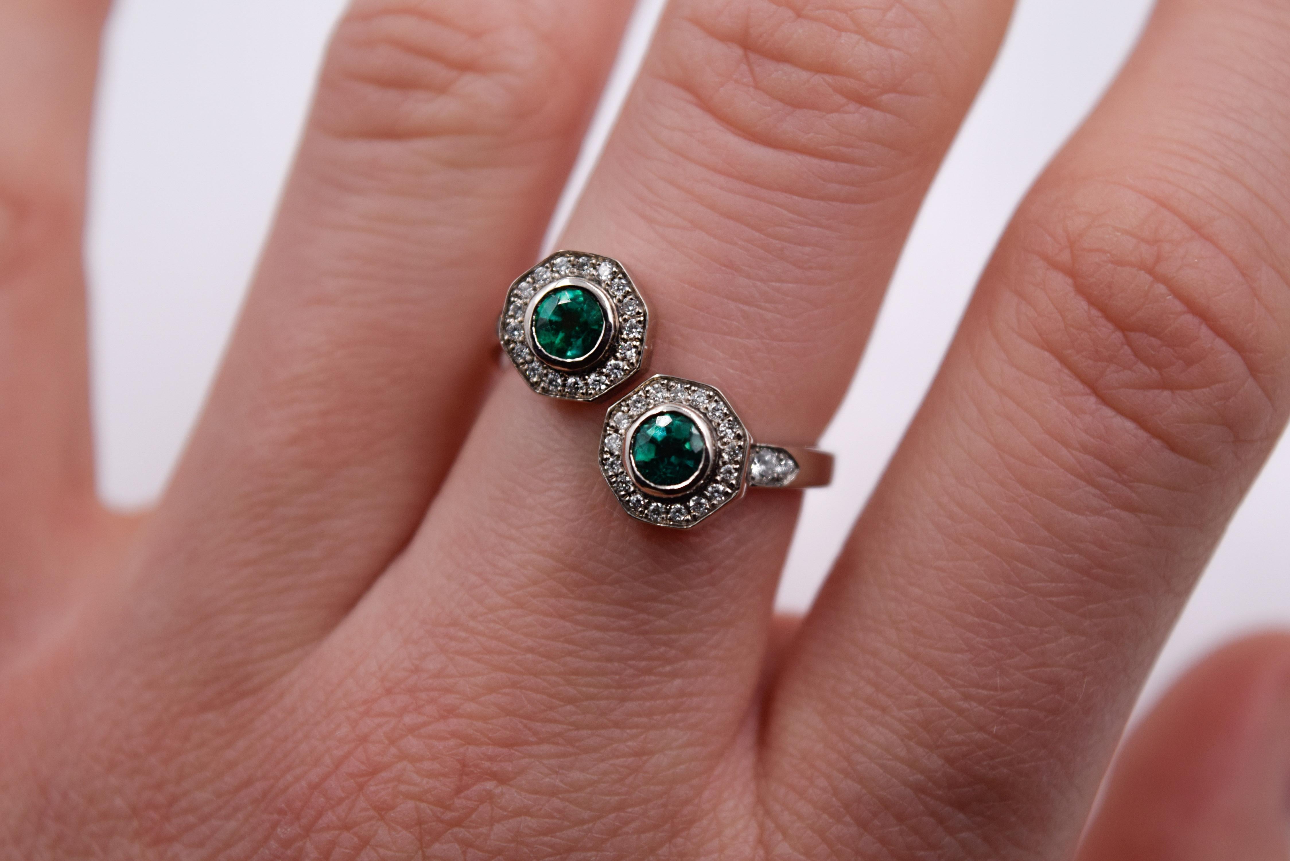Women's 0.46 Carat Emerald and 0.38 Carat White Diamond Bypass Diamond Ring For Sale