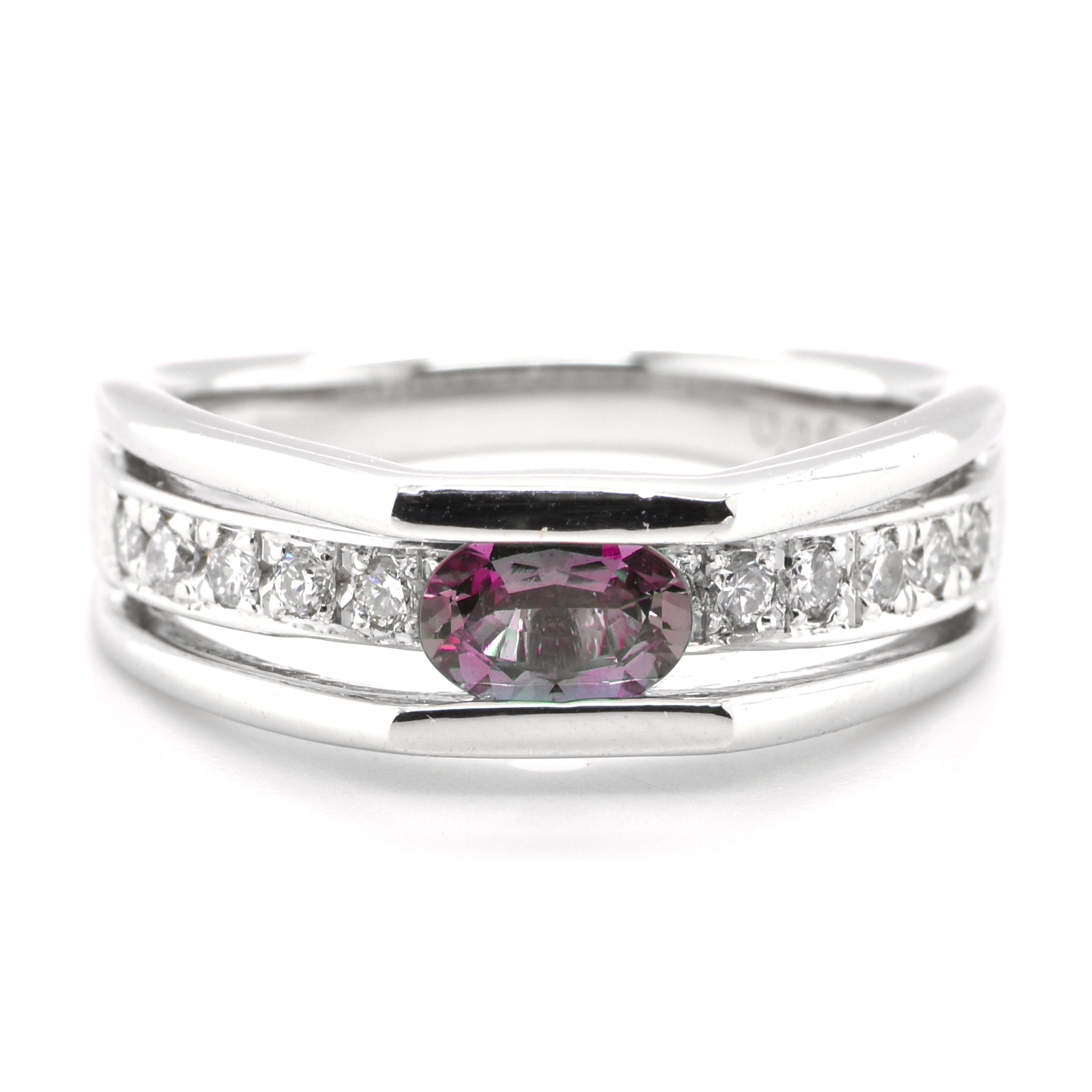 A gorgeous ring featuring a 0.46 Carat, Natural Alexandrite and 0.25 Carats of Diamond Accents set in Platinum. Alexandrites produce a natural color-change phenomenon as they exhibit a Bluish Green Color under Fluorescent Light whereas a Purplish