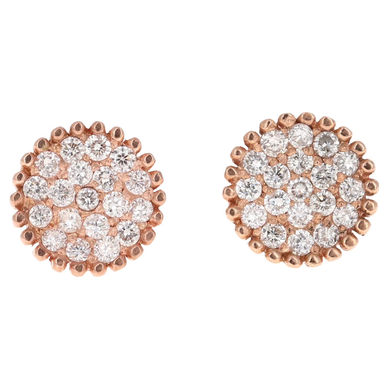 Boucles d'oreilles en or rose 14 carats avec diamant naturel de 0,46 carat

Ces boucles d'oreilles en grappe sont ornées de diamants naturels de taille ronde pesant 0,46 carat. La pureté des diamants est SI et la couleur est F.  Le poids total en