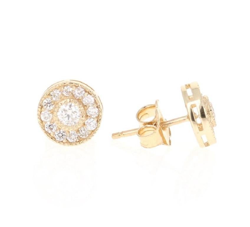 These fun & versatile earrings have 2 Round Cut Diamonds that weigh 0.19 carats and 24 Round Cut Diamonds that weigh 0.27 carats. The total carat weight of the earrings are 0.46 carats. (Clarity: SI, Color: F)
Curated in 14 Karat Yellow Gold and
