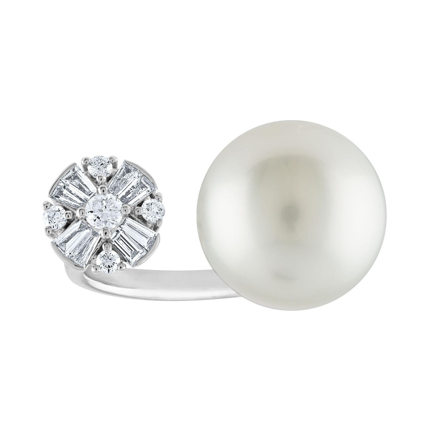 Between The Finger Ring
The ring is 18K White Gold
There are 0.46 Carats in Diamonds G/H VS/SI
The South Sea Pearl is 14.50MM
The ring is a size 7.25, sizable.
The ring weighs 8.90 grams