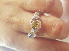 0.46 Cts Fancy Diamond on "Ribbon" 18 Kt Gold d'Avossa Ring