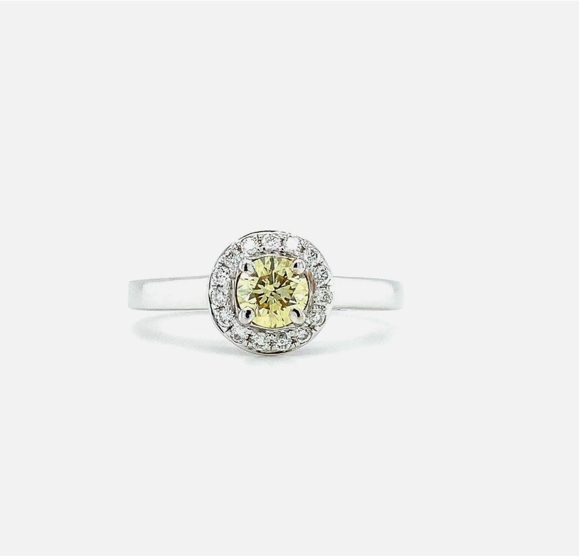 0.46ct Fancy yellow diamond IGI solitaire engagement ring 18ct white gold
0.81ct IGI certified Fancy Vivid Yellow round diamond engagement ring in 18 gold.

Chunky yellow diamond fancy with certificate in 18ct white gold.

Fancy yellow solitaire