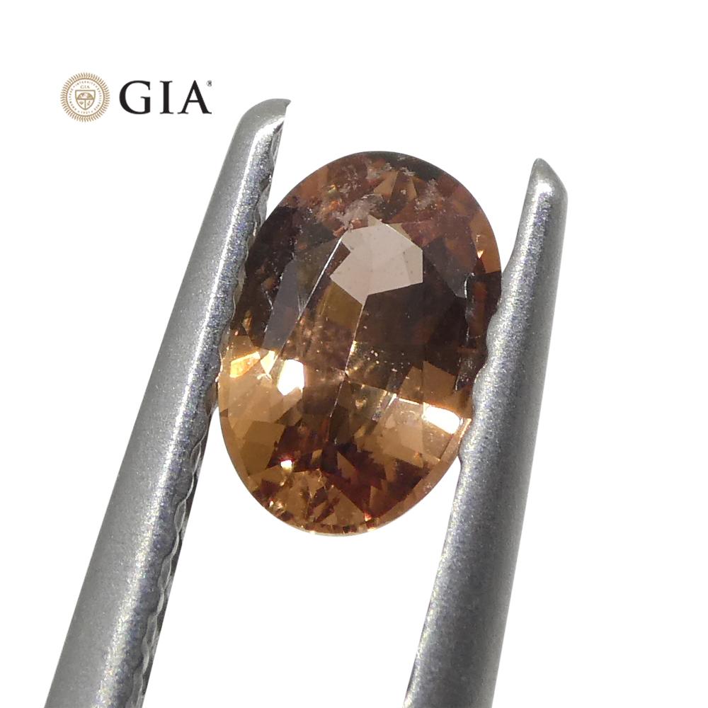 Taille ovale 0.46 Carat Oval Pinkish Orange Padparadscha Sapphire Gia Certified Madagascar en vente