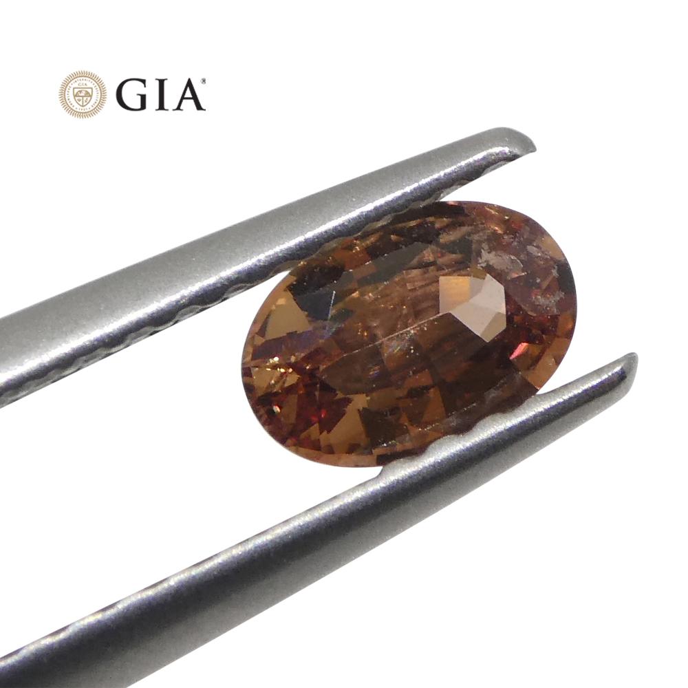 0.46 Carat Oval Pinkish Orange Padparadscha Sapphire Gia Certified Madagascar In New Condition For Sale In Toronto, Ontario