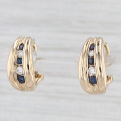 Orecchini con gancio a J con diamante e zaffiro blu da 0,46 ct. in oro 14 ct.
