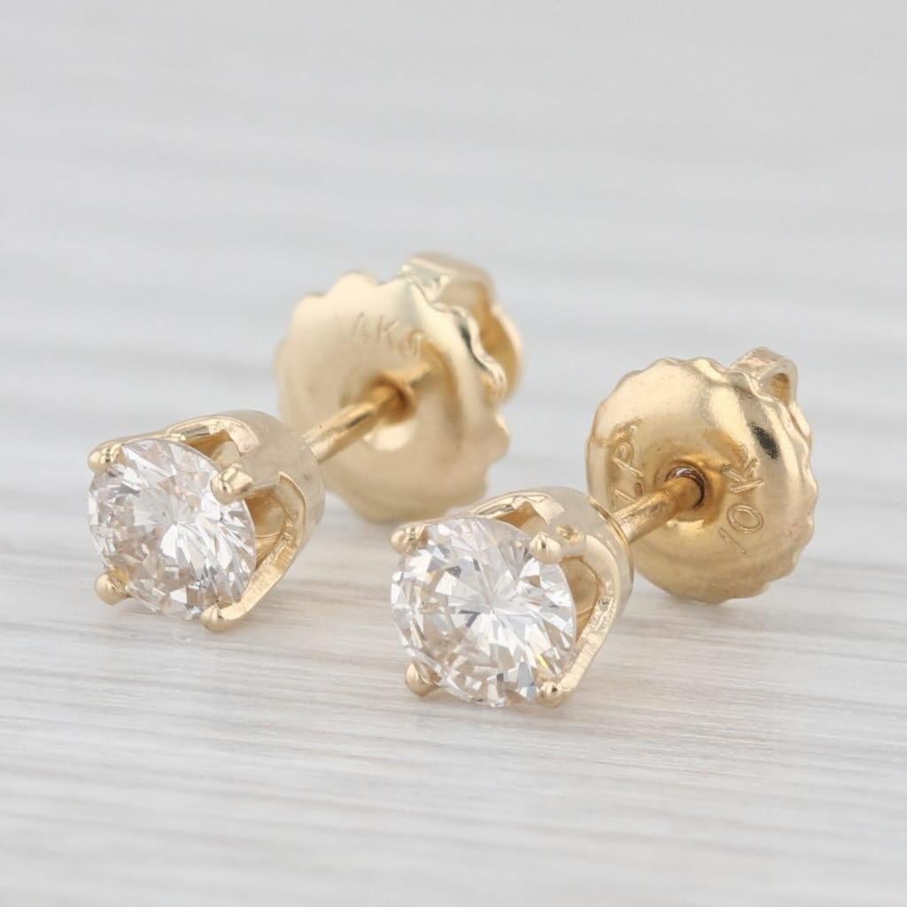 Clous d'oreilles solitaires ronds en or jaune 14 carats avec diamants de 0,46 carat Bon état - En vente à McLeansville, NC