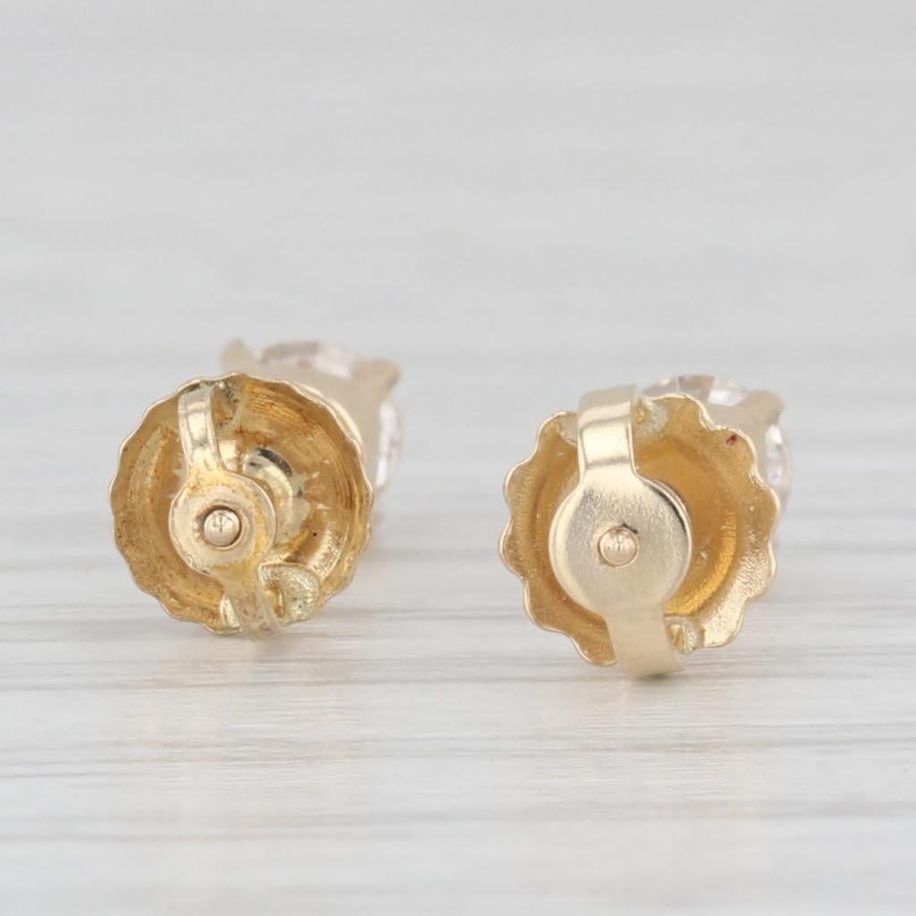 Clous d'oreilles solitaires ronds en or jaune 14 carats avec diamants de 0,46 carat en vente 1