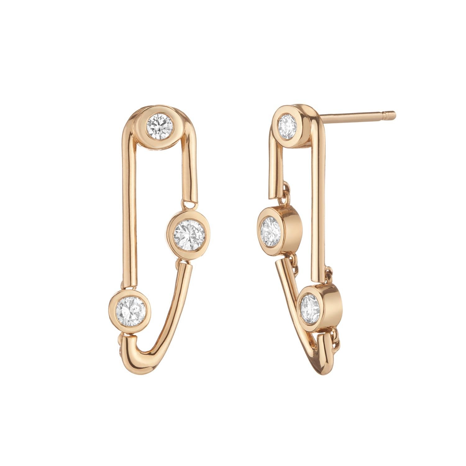 These pair of diamond left and right stud earrings are connected at 4 different spots on each earring, providing movement as you wear and move with them.

Inspired by the narrow shape of the West End area in New York City, these dangling earrings