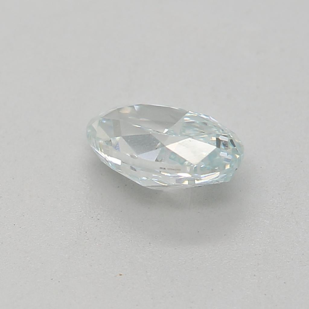 0.47-CARAT, FANCY LIGHT BLUISH GREEN, OVAL CUT DIAMOND VS1 Clarity GIA Certified In New Condition For Sale In Kowloon, HK