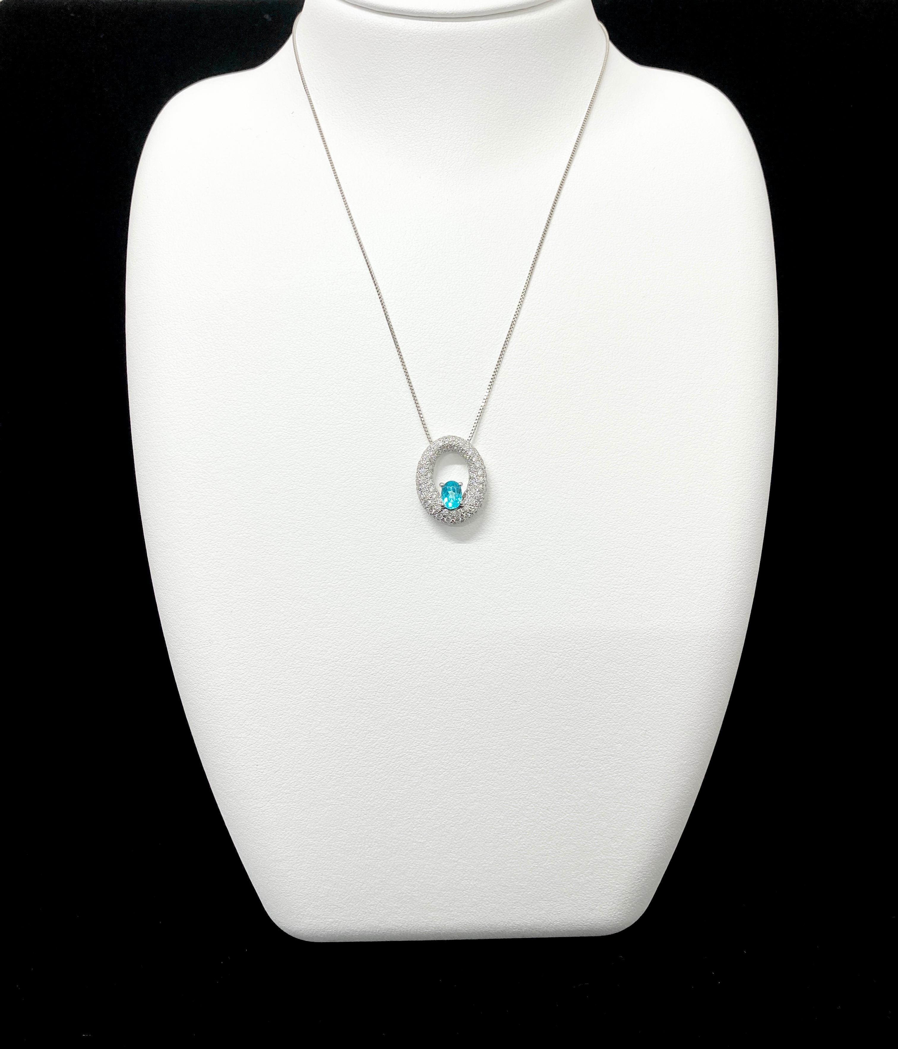 A stunning Pendant featuring a 0.47 Carat, Natural Paraiba Tourmaline and 1.03 Carats of Diamond Accents set in Platinum. Paraiba Tourmalines were only discovered 30 years ago in the Brazilian state of the same name- Paraiba. Since then they have