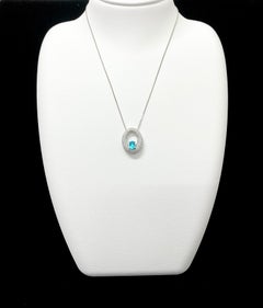 0.47 Carat Natural Brazilian Paraiba Tourmaline Pendant Set in Platinum