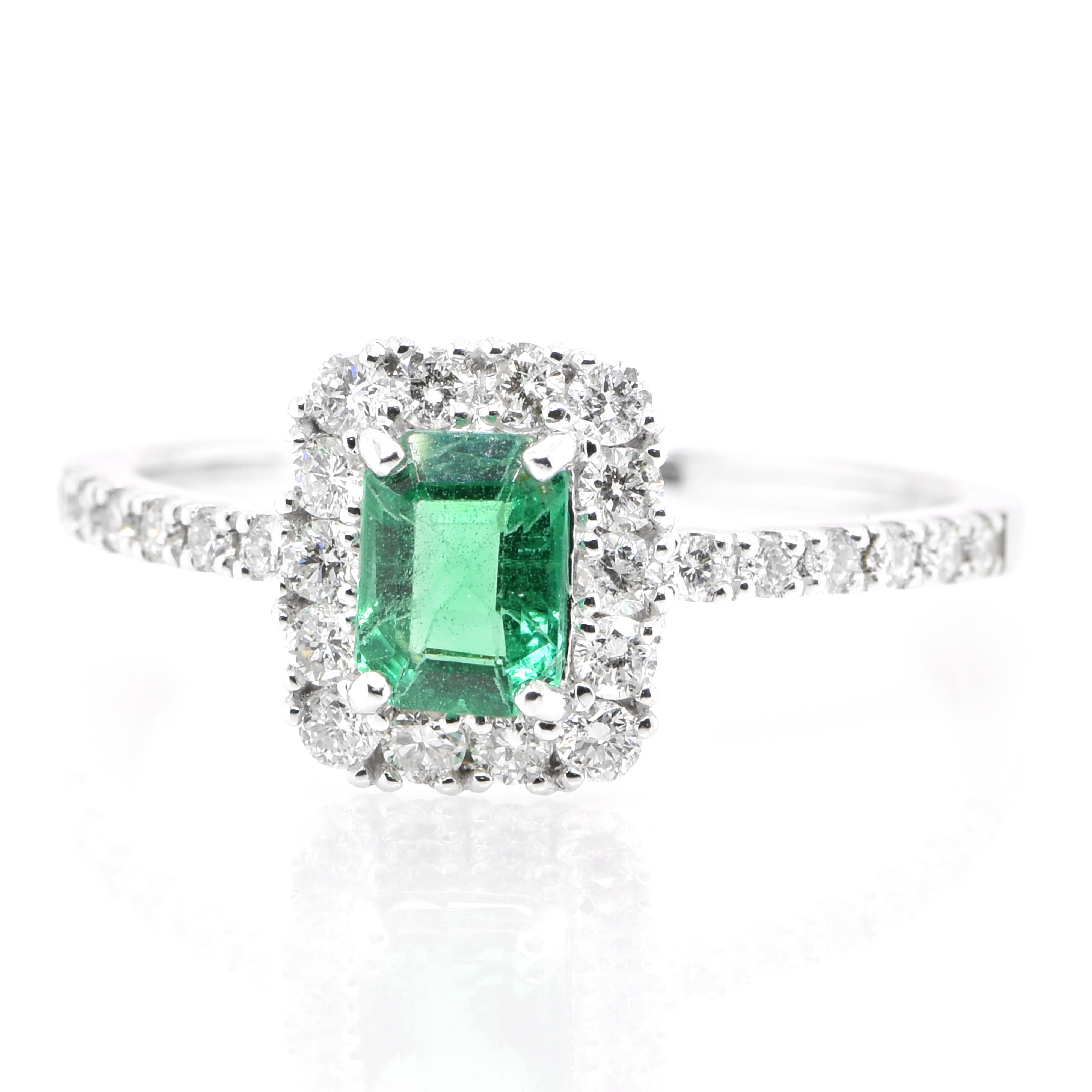 Modern 0.47 Carat Natural Emerald and Diamond Engagement Ring Set in Platinum