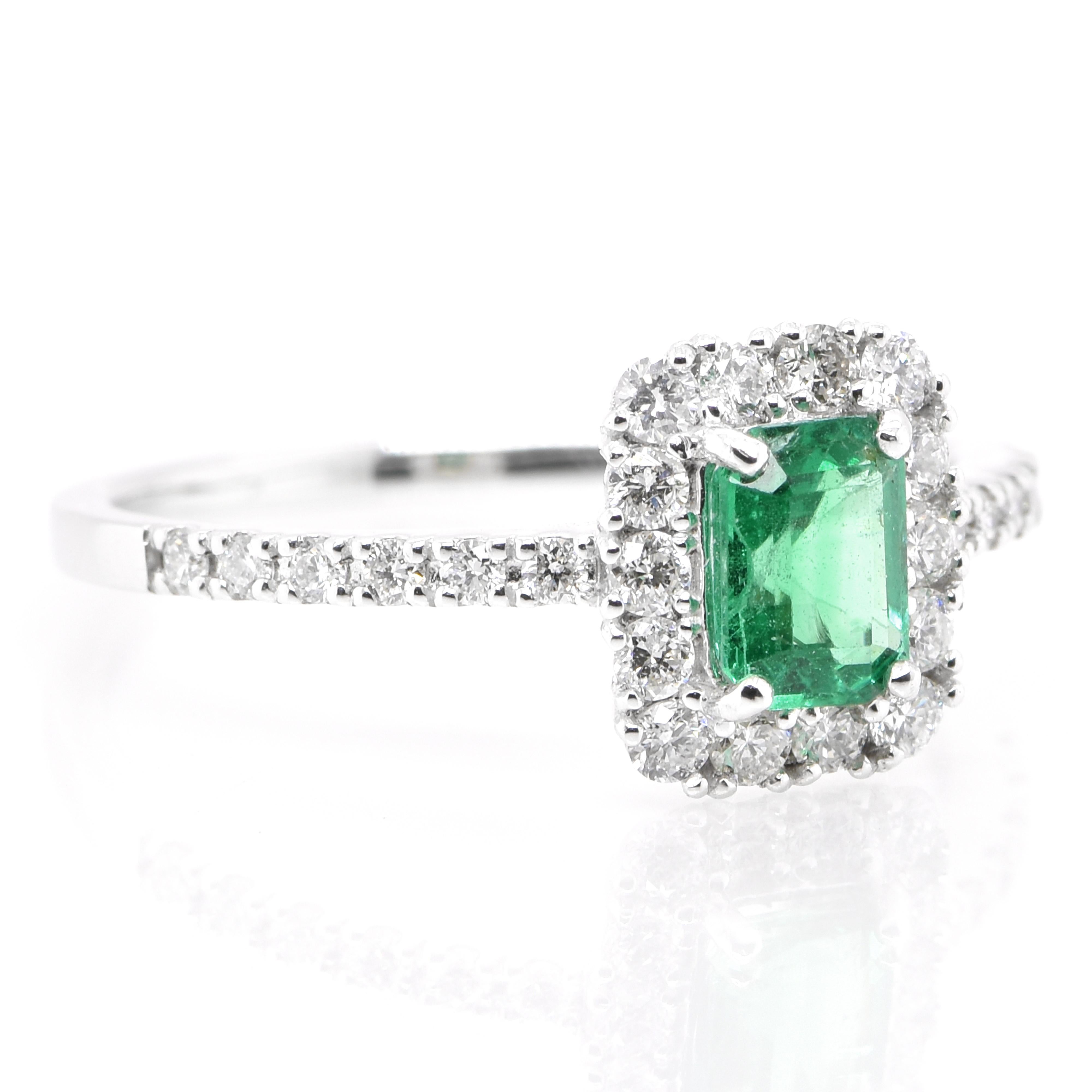 Emerald Cut 0.47 Carat Natural Emerald and Diamond Engagement Ring Set in Platinum