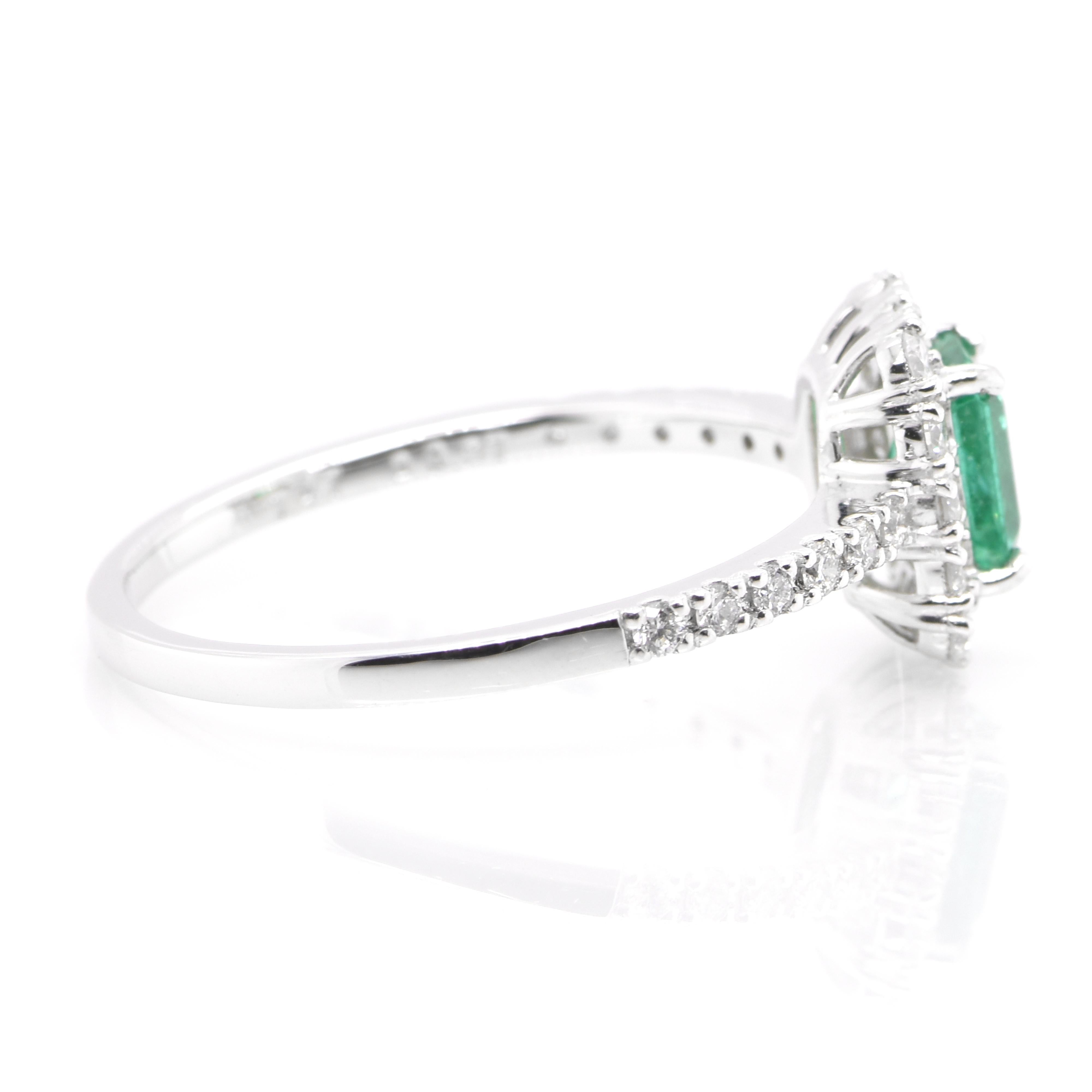 Women's 0.47 Carat Natural Emerald and Diamond Engagement Ring Set in Platinum