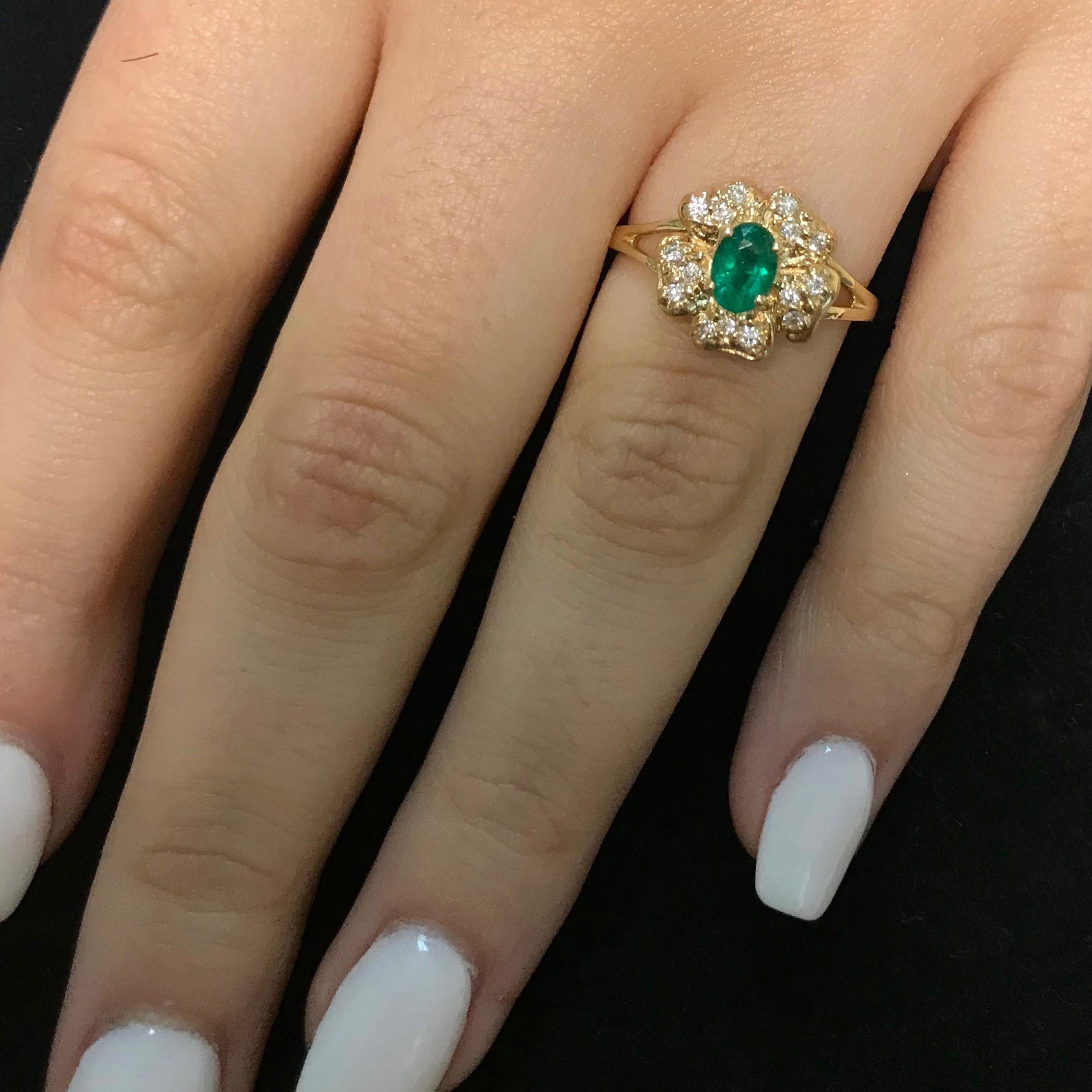 Contemporary 0.47 Carat Oval Emerald and 0.15 Carat White Diamond Ring