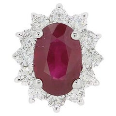 Anillo en racimo de rubíes y diamantes de 0.47 quilates