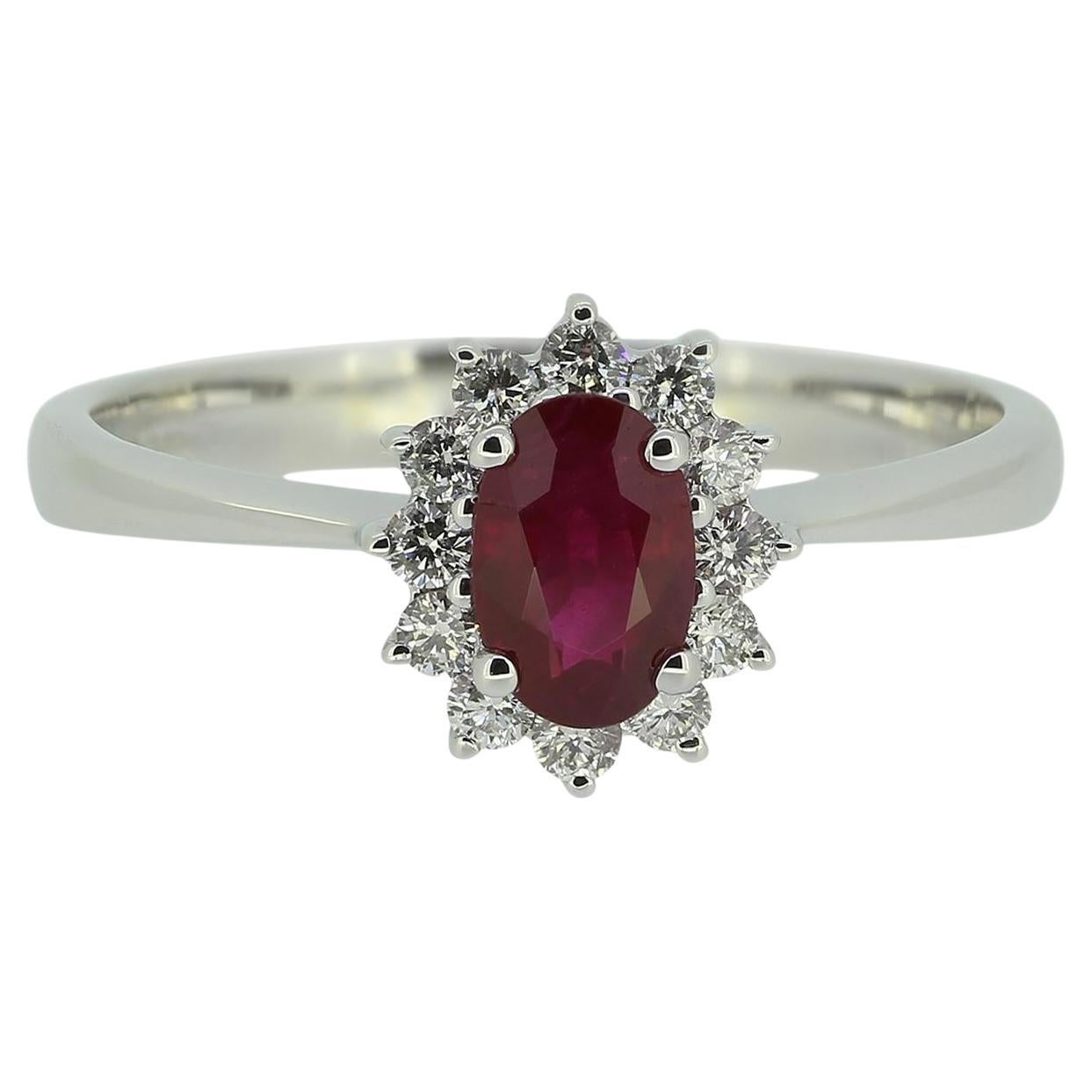 0.47 Carat Ruby and Diamond Cluster Ring For Sale