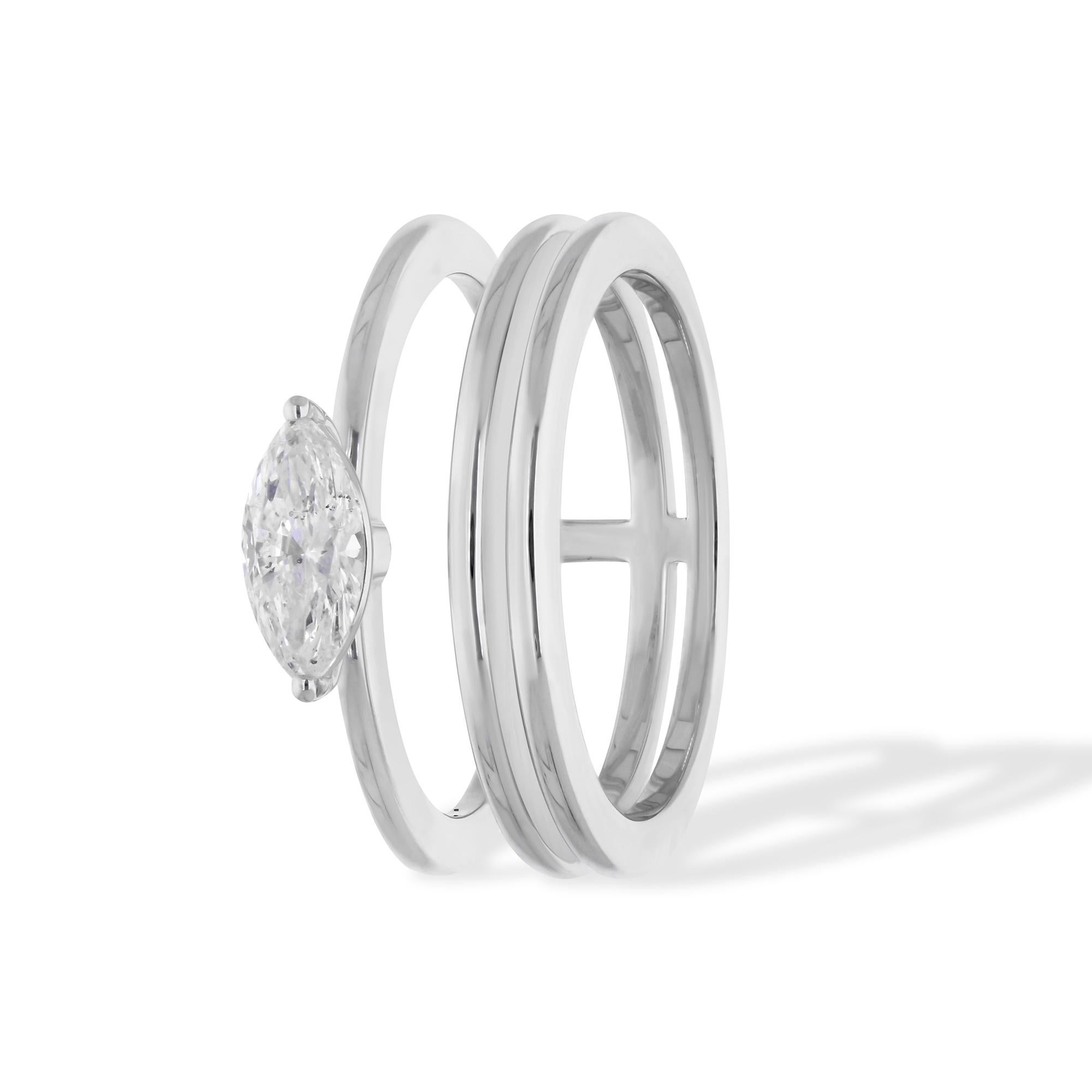 Elevate your style with timeless sophistication with this exquisite 0.47 Carat Solitaire Marquise Diamond Band Ring, meticulously crafted in radiant 14 karat white gold. A symbol of refined elegance, this ring features a stunning marquise-cut