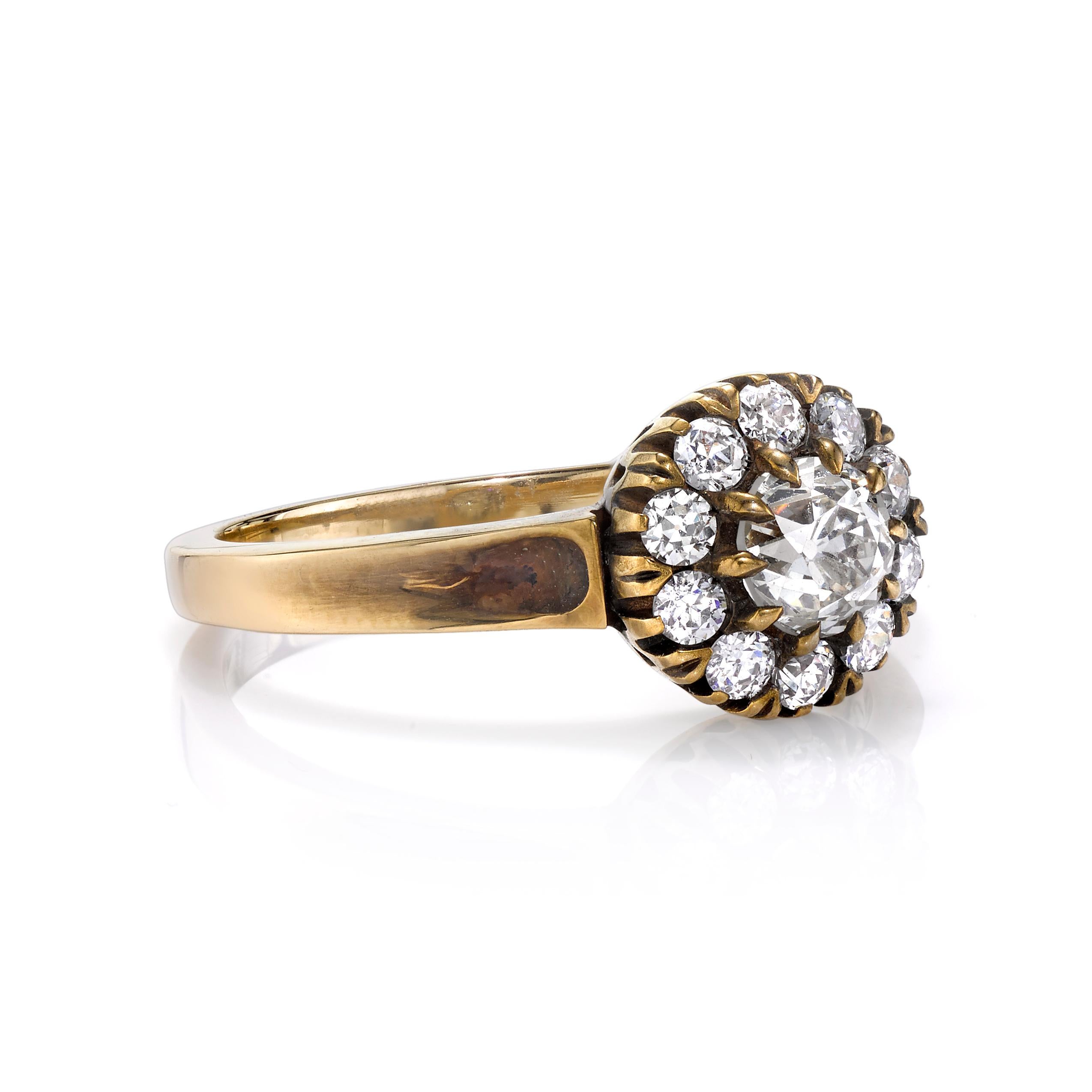 0.47ct L-M/VS antique old mine cut diamond with 0.35ctw diamond accents set in a handcrafted 18K oxidized white and yellow gold mounting. 

Ring is currently size 6. Please contact us about potential re-sizing.

Our jewelry is made locally in Los