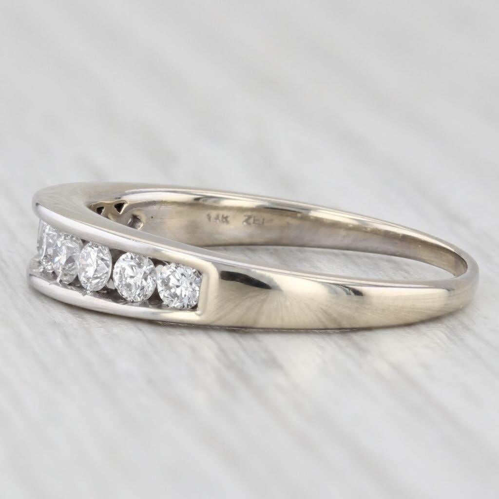 Gemstone Information:
- Natural Diamonds -
Total Carats - 0.47ctw
Cut - Round Brilliant
Color - F - H
Clarity - SI2 - I1

Metal: 14k White Gold 
Weight: 3.5 Grams 
Stamps: 14k
Face Height: 4.4 mm 
Rise Above Finger: 3 mm
Band / Shank Width: 1.4