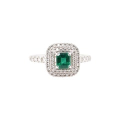 0.48 Carat Colombian Emerald and Diamond Ring Set in Platinum
